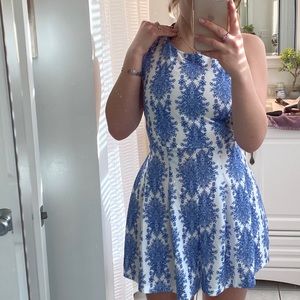 Navy blue and white patterned romper